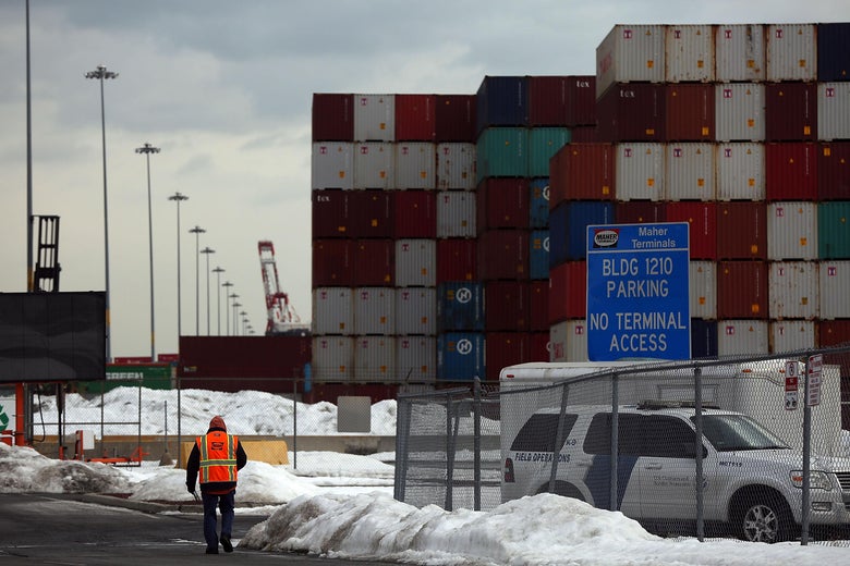 Shipping containers are stacked at the Port of Newark.